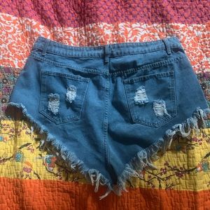 High waisted ripped raw hem denim shorts